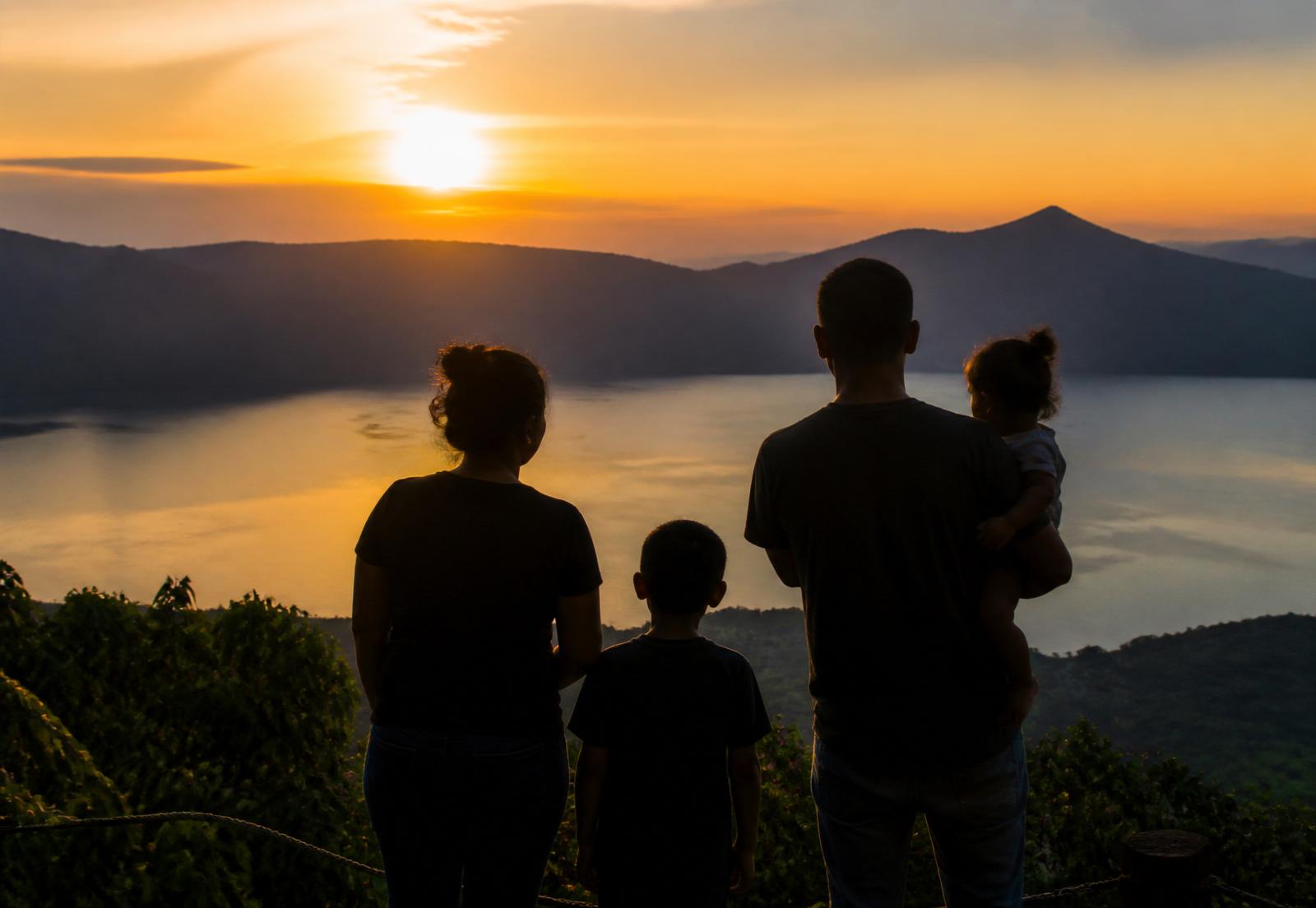 A Salvadoran family contemplating the landscape of home